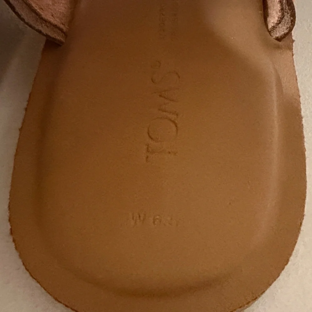 Toms step out